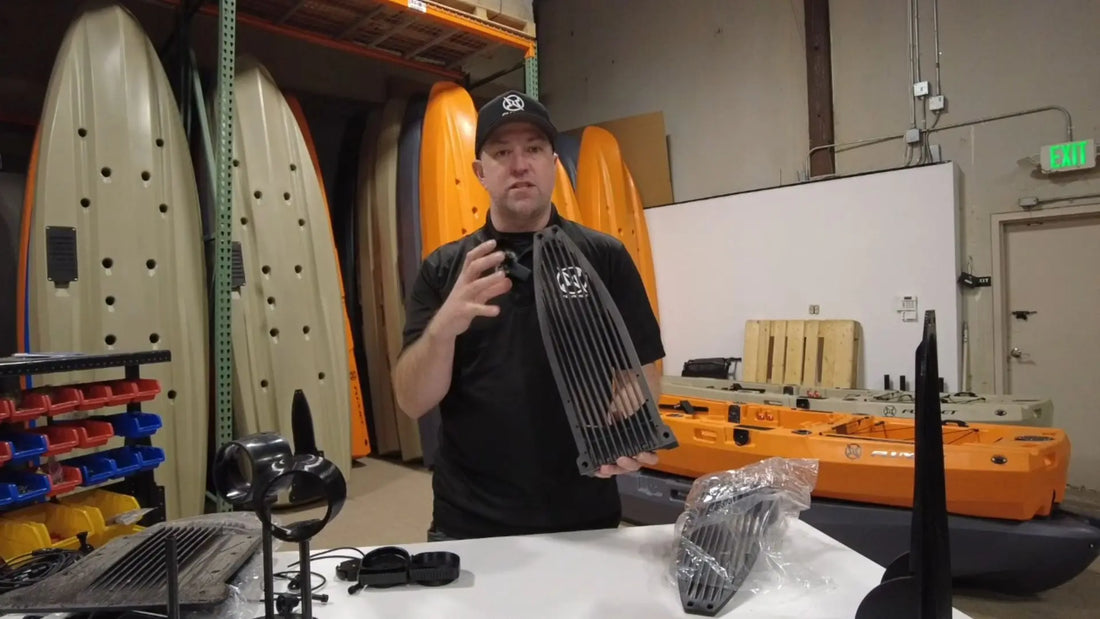 Jason demonstrating the FluxJet kayak ride plate during in-house engineering and testing