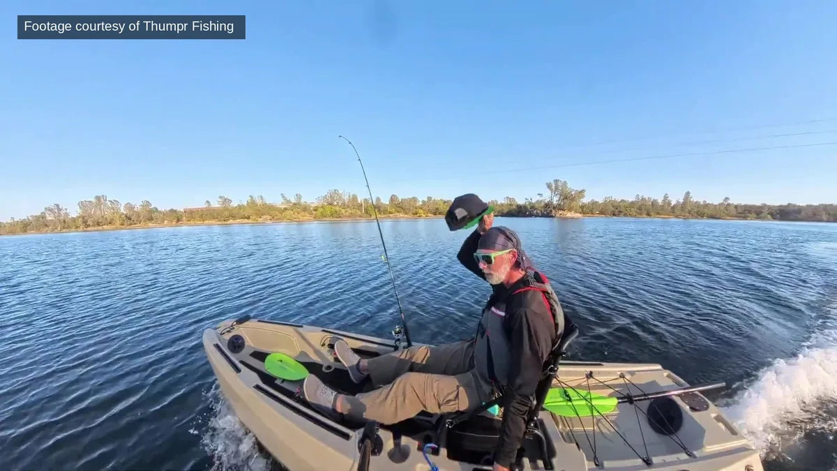 Angler running a tan FluxJet kayak hands-free with his feet on the steering pedals during the FluxLink first look